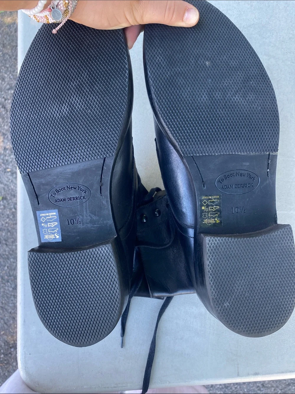Black leather Adam Derrick boots